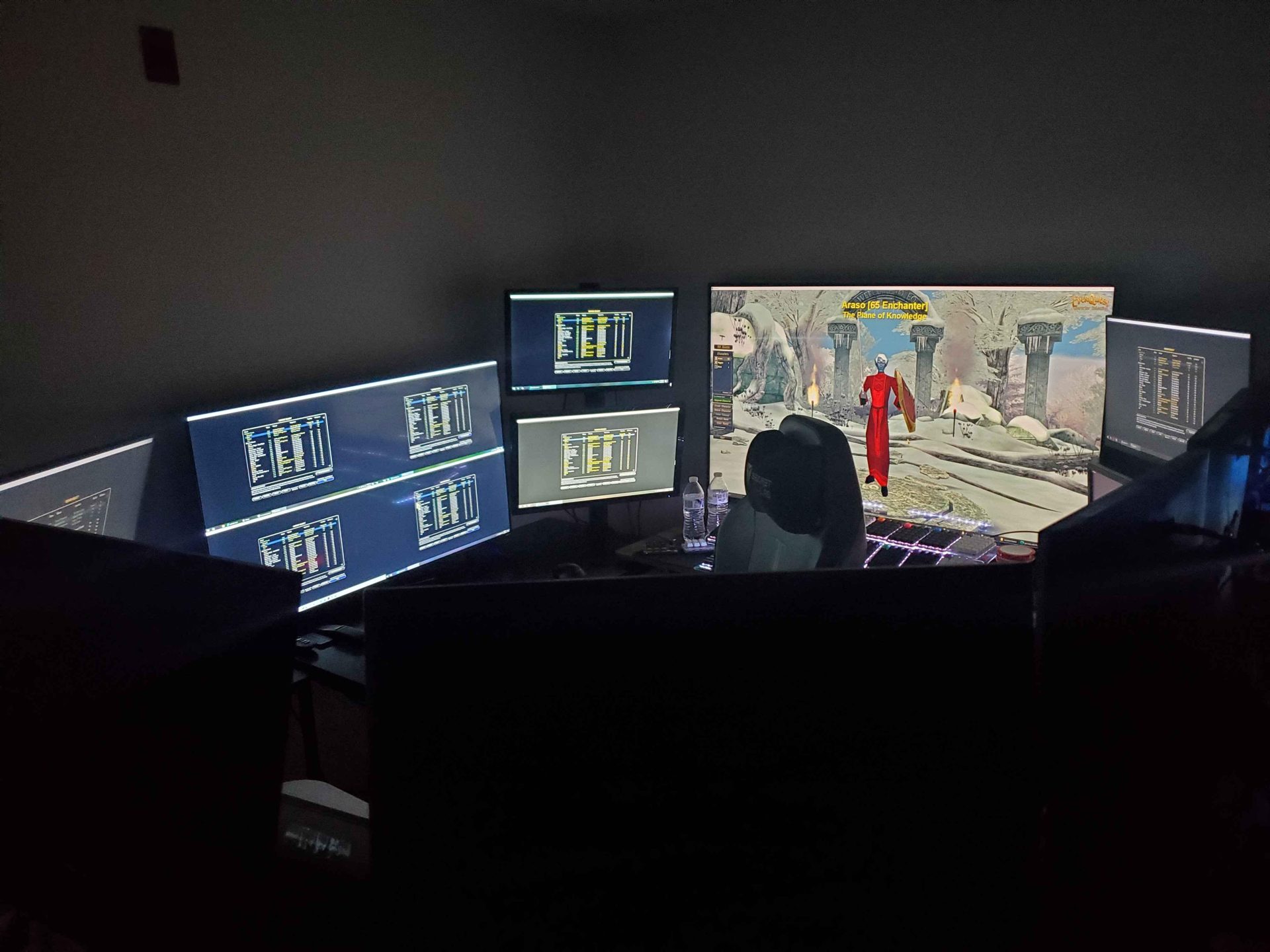 Wraparound multi-monitor corner setup showing EverQuest windows
