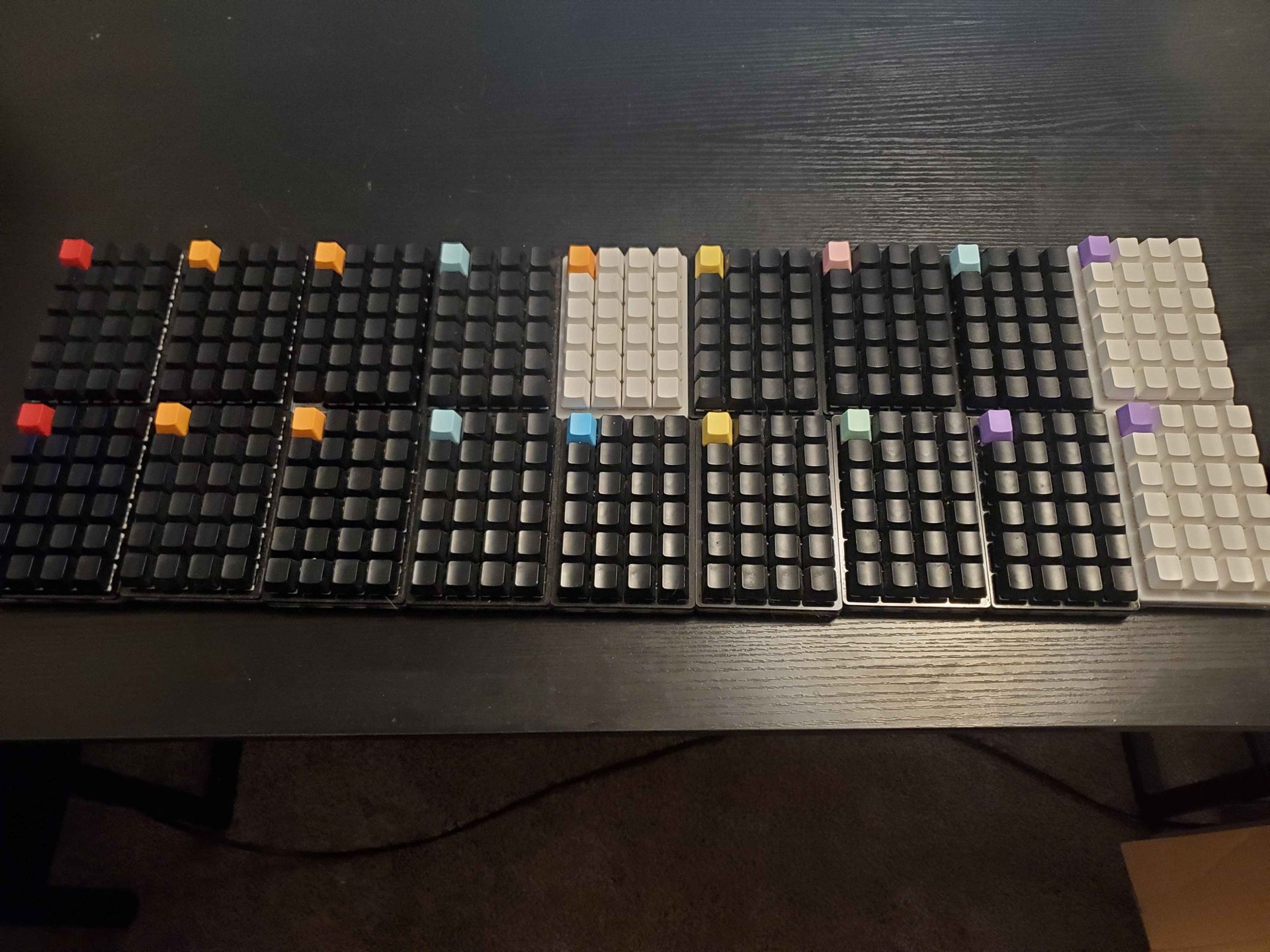 Top-down view of custom macro keypads with color-coded keycaps