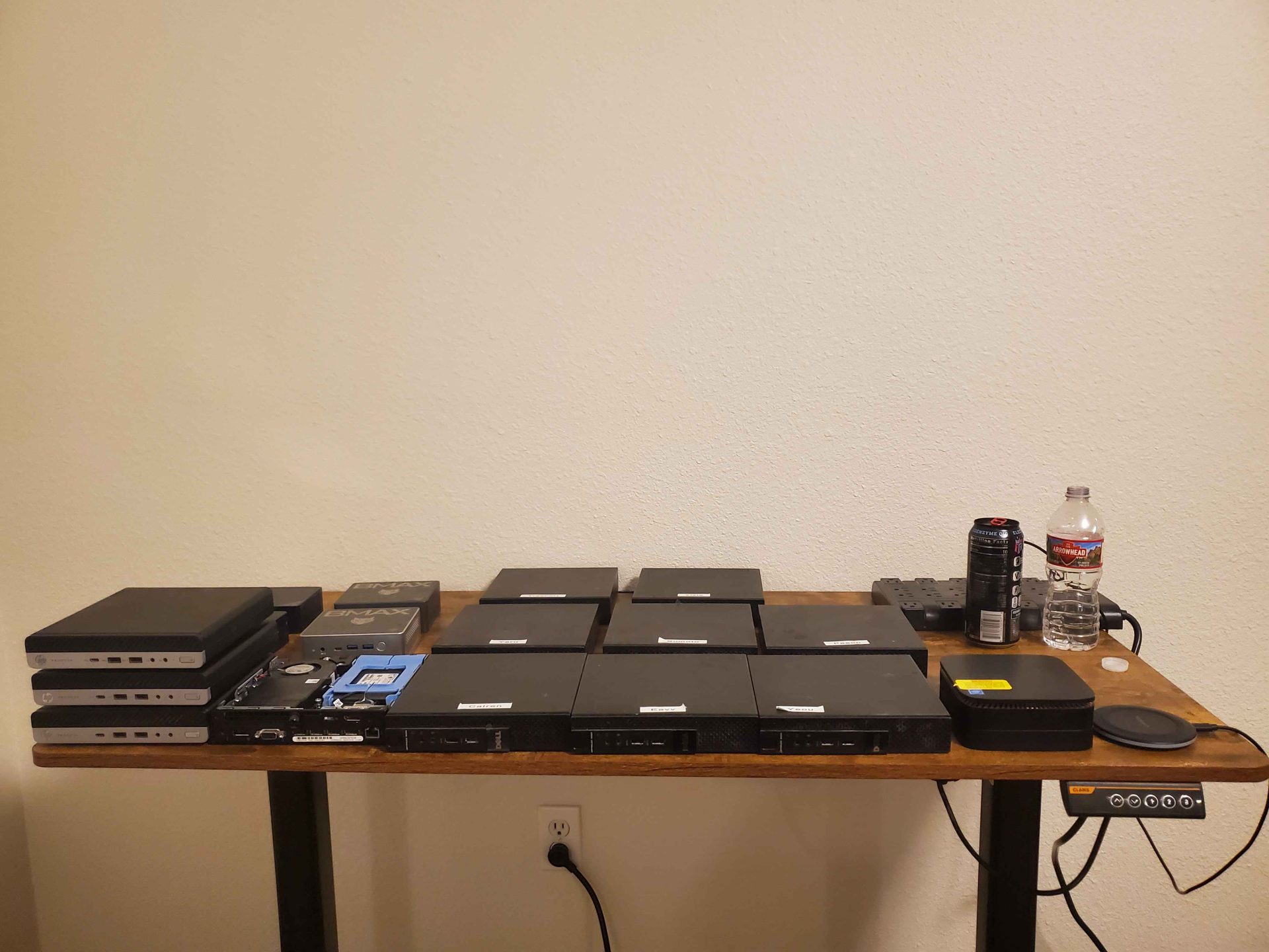 Row of small form factor PCs each labeled with a character name