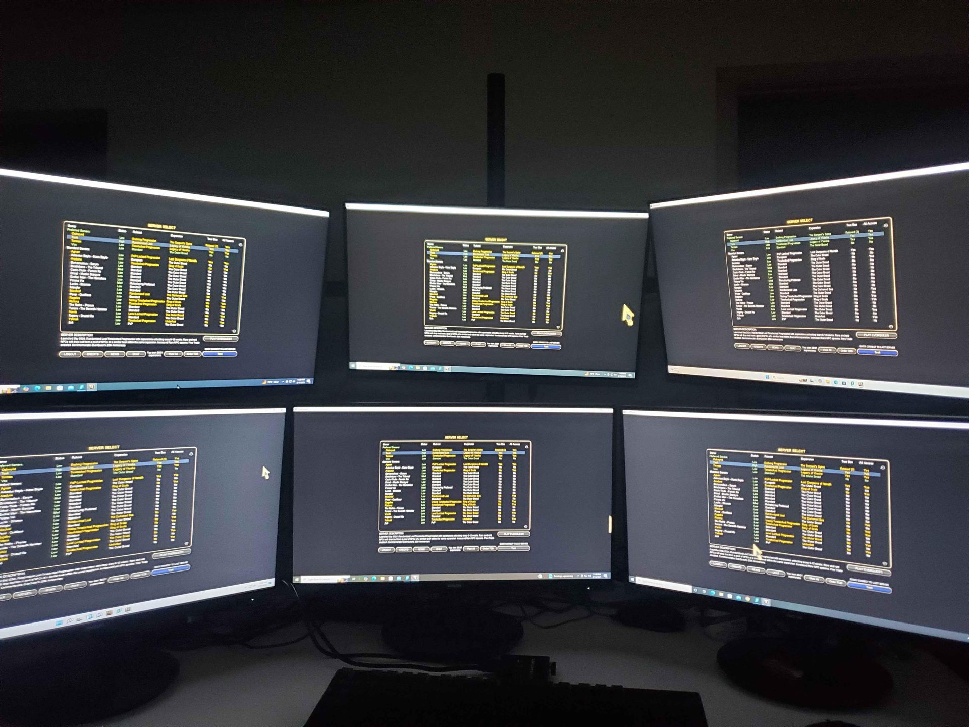 Six monitors all showing the EverQuest server select screen